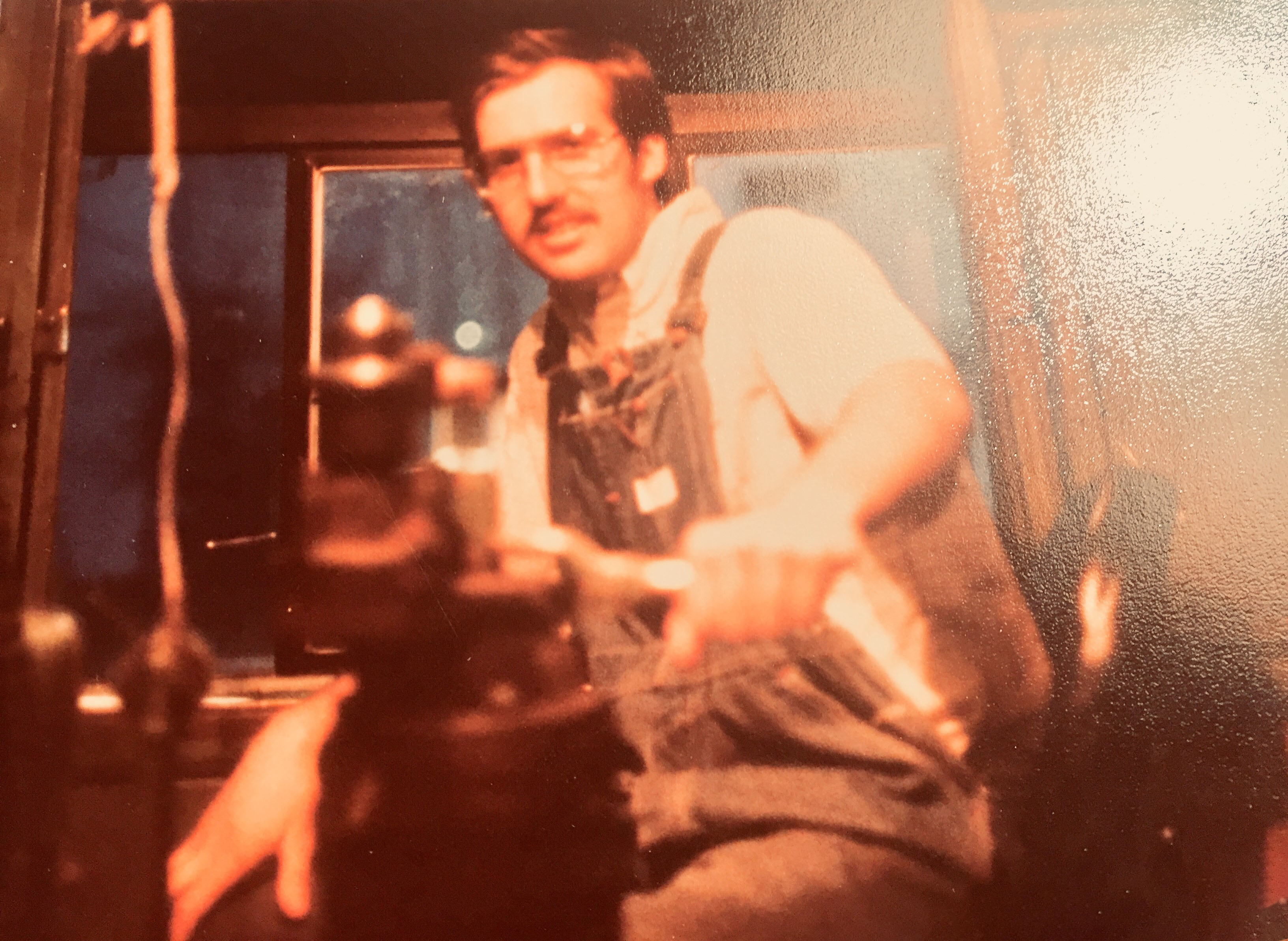 Robert Burkhardt working as a new locomotive engineer in 1980 