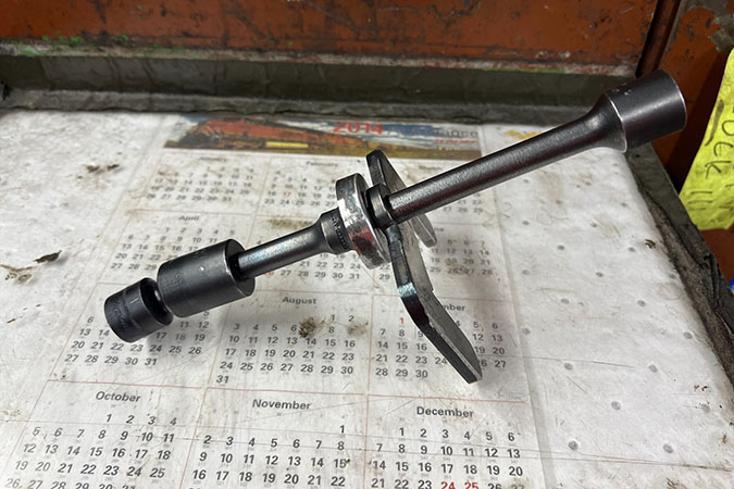 Engine component removal tool used in Northtown